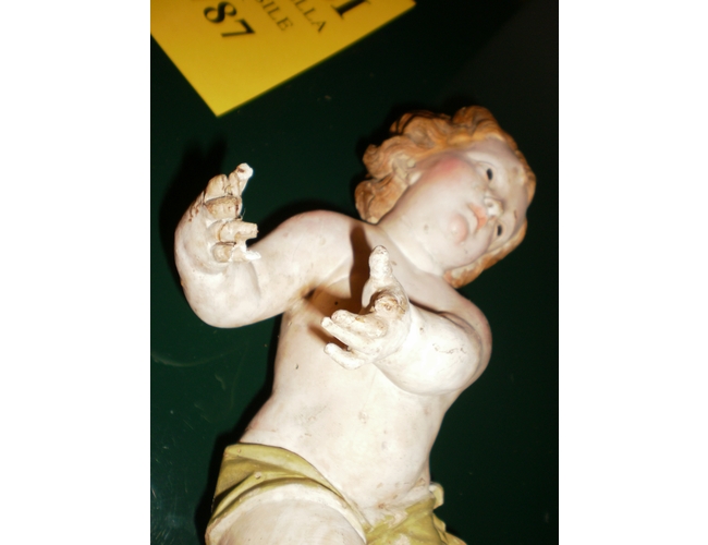 Restauri di chiesa: Antonietta Righi nei restauri di statue, crocifissi, arredi sacri, oggetti 